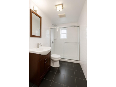 Welcome to this charming all-brick single-family home, perfectly on Douglaston Park Golf Course in New York - for sale on GolfHomes.com, golf home, golf lot