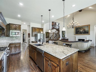 Embrace luxury living in this custom Oakdale home in the golf on The Bridges Golf Club in Texas - for sale on GolfHomes.com, golf home, golf lot