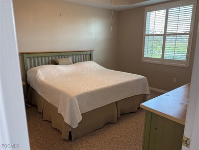 Enjoy Beautiful water and golf views across the 16th and 17th on Legends Golf and Country Club in Florida - for sale on GolfHomes.com, golf home, golf lot