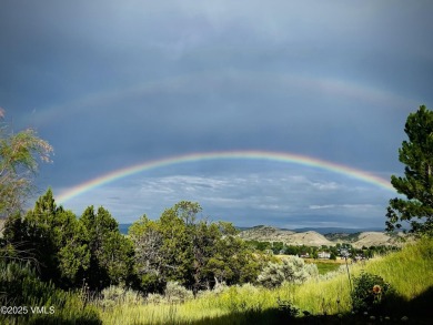 Panoramic views from this air-conditioned 4 bedroom, 3  1/2 on Gypsum Creek Golf Course in Colorado - for sale on GolfHomes.com, golf home, golf lot