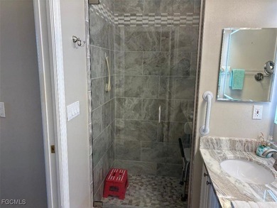 Enjoy Beautiful water and golf views across the 16th and 17th on Legends Golf and Country Club in Florida - for sale on GolfHomes.com, golf home, golf lot