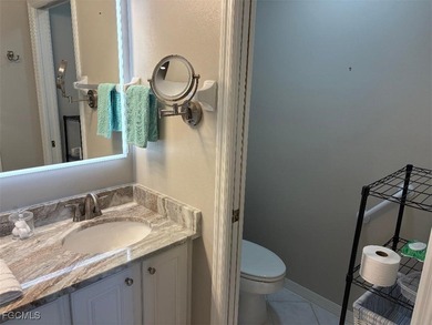 Enjoy Beautiful water and golf views across the 16th and 17th on Legends Golf and Country Club in Florida - for sale on GolfHomes.com, golf home, golf lot