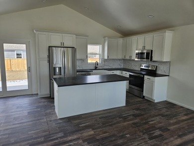 Brand new construction. Located in Hidden Bridge Ranch across on Hidden Bridge Golf Club in Wyoming - for sale on GolfHomes.com, golf home, golf lot