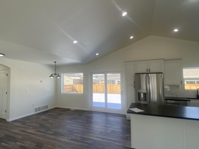 Brand new construction. Located in Hidden Bridge Ranch across on Hidden Bridge Golf Club in Wyoming - for sale on GolfHomes.com, golf home, golf lot