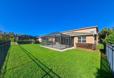 This spacious 4 bedroom, 3.5 bathroom, 3 car garage, 2 story on Heritage Harbor Golf and Country Club in Florida - for sale on GolfHomes.com, golf home, golf lot