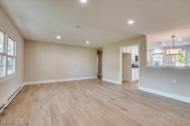 Beautiful end unit features custom eat in kitchen with quartz on Leisure Village East in New Jersey - for sale on GolfHomes.com, golf home, golf lot