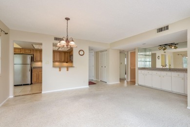 Set in the park-like Forestbrook II community, this rare on East Bay Golf Club in Florida - for sale on GolfHomes.com, golf home, golf lot