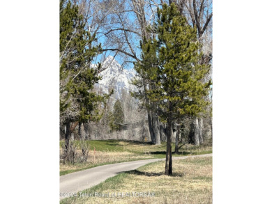 Please consider this 1 acre lot in JH Golf and Tennis for buyers on Jackson Hole Golf and Tennis Club in Wyoming - for sale on GolfHomes.com, golf home, golf lot
