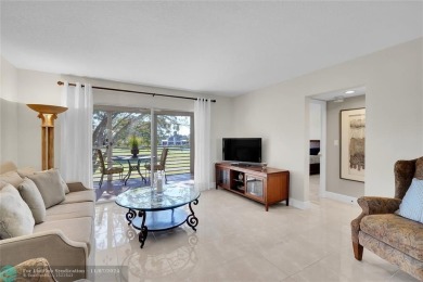 THIS BEAUTIFULLY REDESIGNED AND CRAFTED CONDO for your most on Wynmoor Golf Course in Florida - for sale on GolfHomes.com, golf home, golf lot