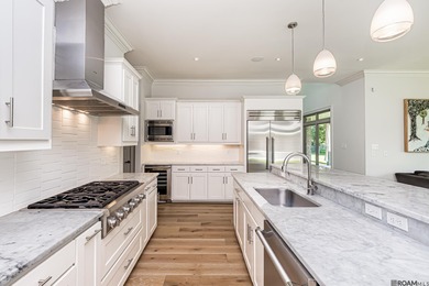 Experience the essence of refined living in this stunning 5 on Pelican Point Golf Club in Louisiana - for sale on GolfHomes.com, golf home, golf lot