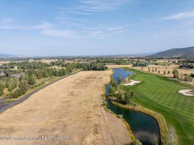 This stunning 0.73-acre parcel, one of the largest in Teton on Teton Springs Resort and Club in Idaho - for sale on GolfHomes.com, golf home, golf lot