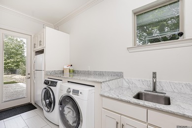 Experience the essence of refined living in this stunning 5 on Pelican Point Golf Club in Louisiana - for sale on GolfHomes.com, golf home, golf lot