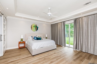 Experience the essence of refined living in this stunning 5 on Pelican Point Golf Club in Louisiana - for sale on GolfHomes.com, golf home, golf lot