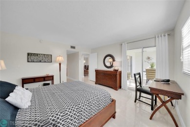 THIS BEAUTIFULLY REDESIGNED AND CRAFTED CONDO for your most on Wynmoor Golf Course in Florida - for sale on GolfHomes.com, golf home, golf lot