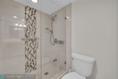 THIS BEAUTIFULLY REDESIGNED AND CRAFTED CONDO for your most on Wynmoor Golf Course in Florida - for sale on GolfHomes.com, golf home, golf lot