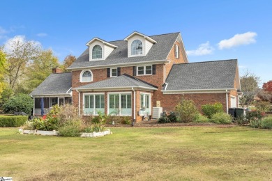 Welcome to your dream home! This stately, three-story brick on Smithfields Country Club in South Carolina - for sale on GolfHomes.com, golf home, golf lot