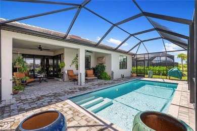 POOL & BREATHTAKING WATER VIEW! Welcome to this better-than-new on Panther Run Golf Club in Florida - for sale on GolfHomes.com, golf home, golf lot