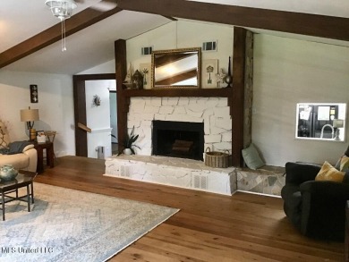 Canal front Coastal Home. Remodeled in 2023. 2 story modern on Mississippi National Golf Course in Mississippi - for sale on GolfHomes.com, golf home, golf lot