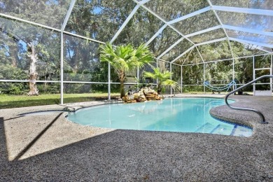 Spectacular concrete block pool home tucked at the end of a on The Grand Club - Pine Lakes Course in Florida - for sale on GolfHomes.com, golf home, golf lot