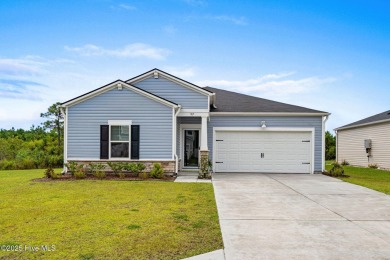 Welcome to this impeccably maintained 3-bedroom, 2-bathroom home on Ocean Ridge Plantation in North Carolina - for sale on GolfHomes.com, golf home, golf lot