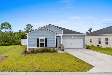 Welcome to this impeccably maintained 3-bedroom, 2-bathroom home on Ocean Ridge Plantation in North Carolina - for sale on GolfHomes.com, golf home, golf lot
