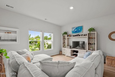 Welcome to this impeccably maintained 3-bedroom, 2-bathroom home on Ocean Ridge Plantation in North Carolina - for sale on GolfHomes.com, golf home, golf lot
