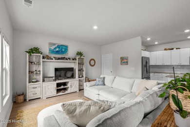 Welcome to this impeccably maintained 3-bedroom, 2-bathroom home on Ocean Ridge Plantation in North Carolina - for sale on GolfHomes.com, golf home, golf lot