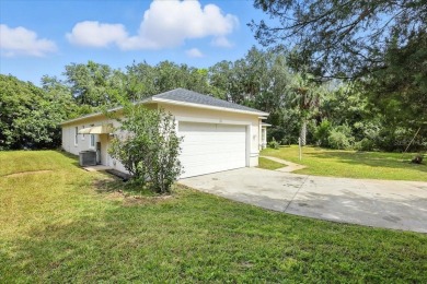 Spectacular concrete block pool home tucked at the end of a on The Grand Club - Pine Lakes Course in Florida - for sale on GolfHomes.com, golf home, golf lot