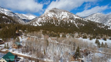 Beautiful tree covered lot in Star Valley Ranch.  This lot is on Aspen Hills Golf Course in Wyoming - for sale on GolfHomes.com, golf home, golf lot