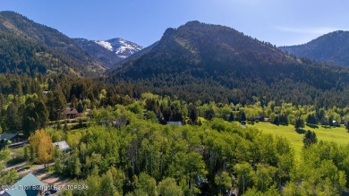 Beautiful tree covered lot in Star Valley Ranch.  This lot is on Aspen Hills Golf Course in Wyoming - for sale on GolfHomes.com, golf home, golf lot