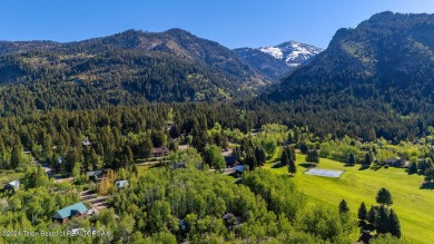 Beautiful tree covered lot in Star Valley Ranch.  This lot is on Aspen Hills Golf Course in Wyoming - for sale on GolfHomes.com, golf home, golf lot