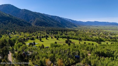 Beautiful tree covered lot in Star Valley Ranch.  This lot is on Aspen Hills Golf Course in Wyoming - for sale on GolfHomes.com, golf home, golf lot