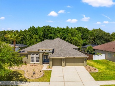 Welcome to 5648 Spectacular Bid Drive, nestled within the on Lexington Oaks Golf Club in Florida - for sale on GolfHomes.com, golf home, golf lot