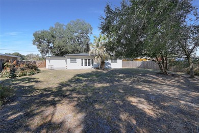 Under contract-accepting backup offers. Charming single-family on Interlachen Country Club in Florida - for sale on GolfHomes.com, golf home, golf lot