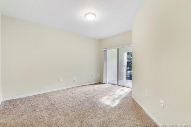 First-floor 2-bedroom, 2-bath condo in the perfect location on St. Lucie Trail Golf Club in Florida - for sale on GolfHomes.com, golf home, golf lot