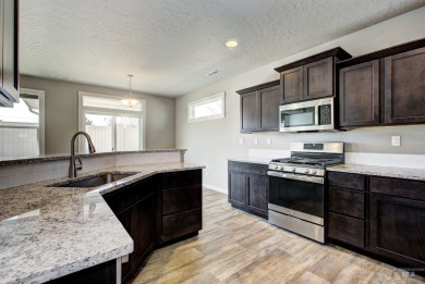 ASSUMABLE FHA LOAN at 2.6%! Don't miss out on this turn-key home on Hunters Point Golf Club in Idaho - for sale on GolfHomes.com, golf home, golf lot