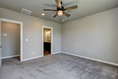 ASSUMABLE FHA LOAN at 2.6%! Don't miss out on this turn-key home on Hunters Point Golf Club in Idaho - for sale on GolfHomes.com, golf home, golf lot