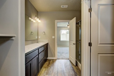 ASSUMABLE FHA LOAN at 2.6%! Don't miss out on this turn-key home on Hunters Point Golf Club in Idaho - for sale on GolfHomes.com, golf home, golf lot
