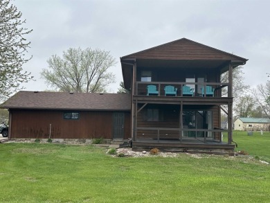 This 5-bedroom, 3 full bathroom, 2 half bath home in Elk Point on Elk Point Country Club in South Dakota - for sale on GolfHomes.com, golf home, golf lot