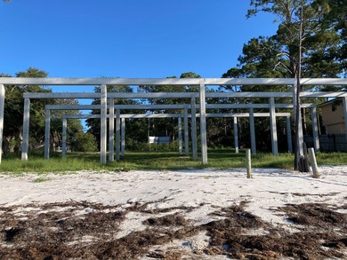 Improved BAY FRONT/GULF FRONT Lot with concrete pilings in place on St. James Bay in Florida - for sale on GolfHomes.com, golf home, golf lot