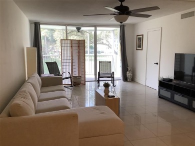 Welcome to this beautifully renovated 2-bedroom, 2-bath condo in on Palm-Aire Country Club and Resort - Palms in Florida - for sale on GolfHomes.com, golf home, golf lot