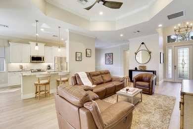 BEAUTIFULLY UPDATED POOL & SPA HOME IN PGA VILLAGE WITH LAKE on PGA Golf Club in PGA Village in Florida - for sale on GolfHomes.com, golf home, golf lot