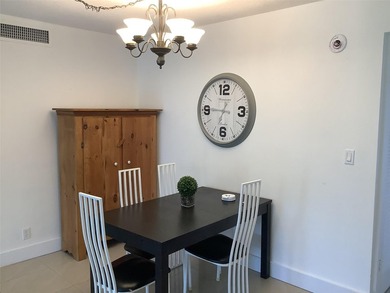 Welcome to this beautifully renovated 2-bedroom, 2-bath condo in on Palm-Aire Country Club and Resort - Palms in Florida - for sale on GolfHomes.com, golf home, golf lot