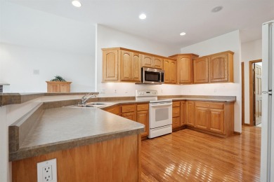 Pride of ownership in this one owner all-brick condo overlooking on Thunder Hills Country Club in Iowa - for sale on GolfHomes.com, golf home, golf lot