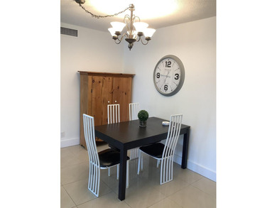 Welcome to this beautifully renovated 2-bedroom, 2-bath condo in on Palm-Aire Country Club and Resort - Palms in Florida - for sale on GolfHomes.com, golf home, golf lot