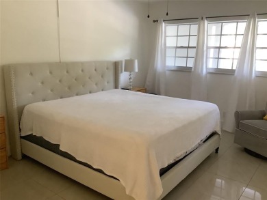 Welcome to this beautifully renovated 2-bedroom, 2-bath condo in on Palm-Aire Country Club and Resort - Palms in Florida - for sale on GolfHomes.com, golf home, golf lot