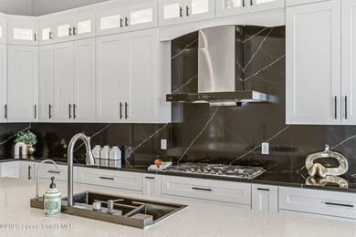 Discover an extraordinary lakefront estate in the Legends at on  in Florida - for sale on GolfHomes.com, golf home, golf lot