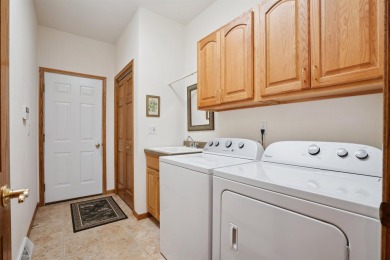 Pride of ownership in this one owner all-brick condo overlooking on Thunder Hills Country Club in Iowa - for sale on GolfHomes.com, golf home, golf lot