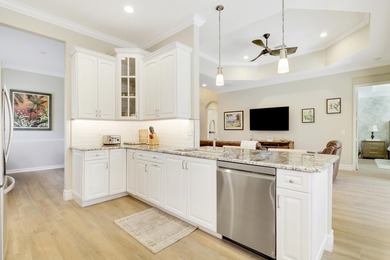 BEAUTIFULLY UPDATED POOL & SPA HOME IN PGA VILLAGE WITH LAKE on PGA Golf Club in PGA Village in Florida - for sale on GolfHomes.com, golf home, golf lot