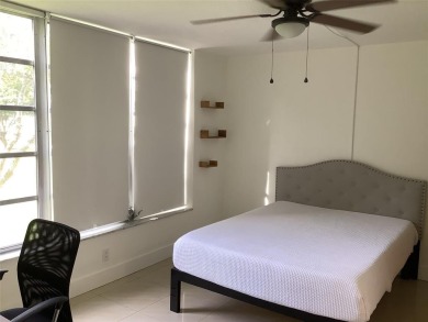 Welcome to this beautifully renovated 2-bedroom, 2-bath condo in on Palm-Aire Country Club and Resort - Palms in Florida - for sale on GolfHomes.com, golf home, golf lot